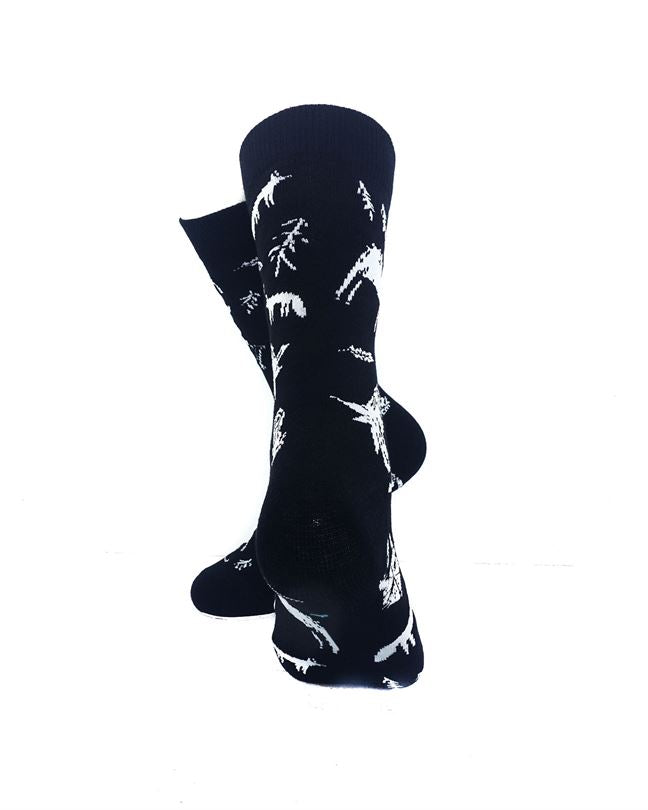 cooldesocks black and white caveman paintings crew socks rear view image
